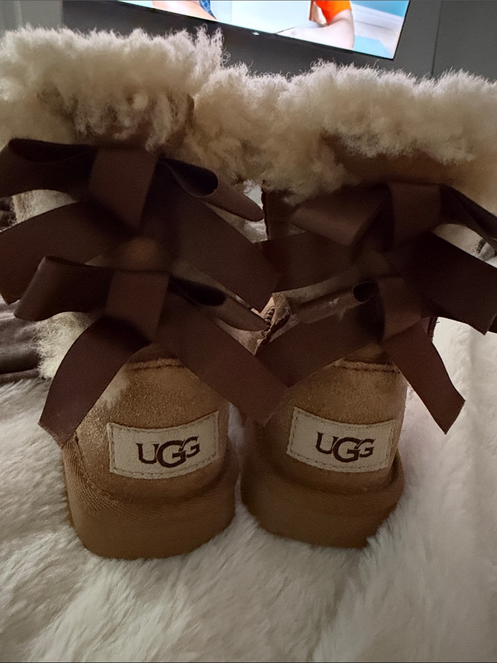 UGG Kids Chestnut Suede Shearling Boots with Brown Ribbon Bows